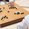 YMI Bamboo 2-Inch Reversible 19x19 / 13x13 Go Game Set Board with 9.2mm Double Convex Yunzi Stones and Bamboo Bowls - Classic Strategy Board Game (Baduk/Weiqi) - Image 2